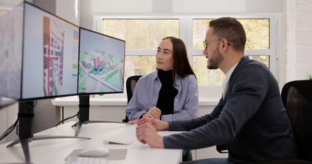 Obraz premium Engineer Uses GIS Software For Construction Project Inspection