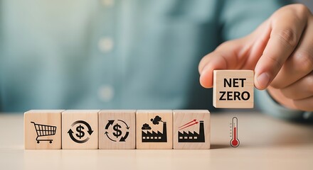 Hand placing wooden block with net zero text near icons representing commerce, finance, industry, and climate change concept