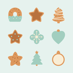 A collection of various festive gingerbread cookies and ornaments with light blue and white icing details.