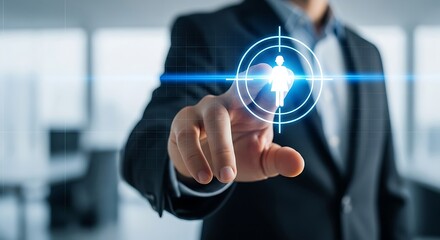 Businessman hand pointing at glowing digital target icon representing human resource selection, recruitment, or customer focus