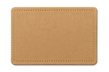 Blank leather patch or clothing label for jeans, having stitching holes along its rustic brown rectangular border