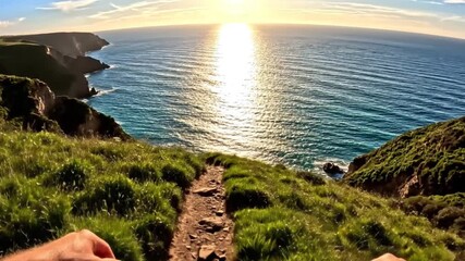 An awe-inspiring first-person perspective captures a winding dirt path along a dramatic coastal cliff, leading towards the vast, shimmering ocean. The golden sun hangs low in the sky, casting a brilli
