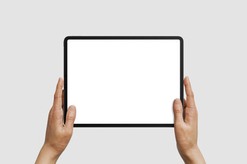Hands Holding Tablet Mockup with Blank Screen on Light Background