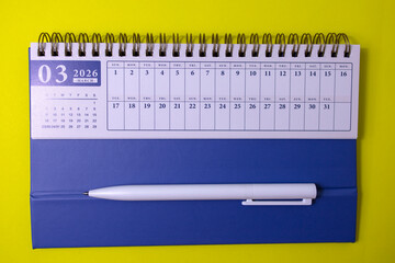 Hello, March. March 2026 planning calendar on a yellow background.