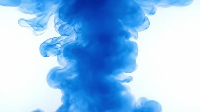 A central column of vibrant blue substance disperses in a clear fluid forming billowing cloud-like swirls and eddies against a bright white backdrop