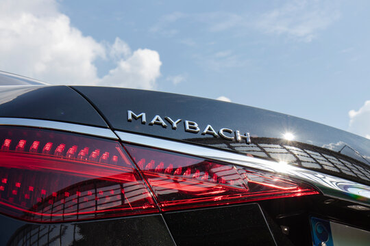 Close-up of MAYBACH rear badge and taillight under sunny sky - Seoul, South Korea - August 21 2022