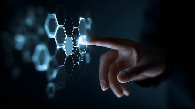 Human finger interacts with glowing hexagonal digital interface elements in darkness