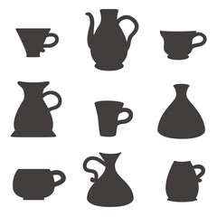 Vector illustration set of ceramic coffee cups, mugs, and pots with milk pitchers for a hot cafe breakfast beverage design