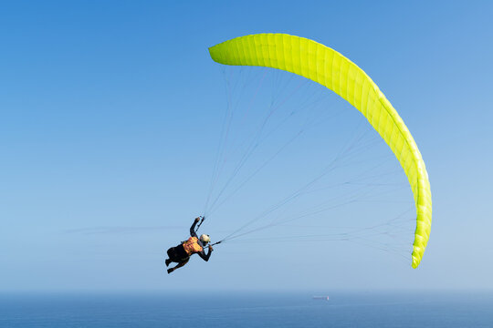Paraglider Against Brilliant Blue Sky