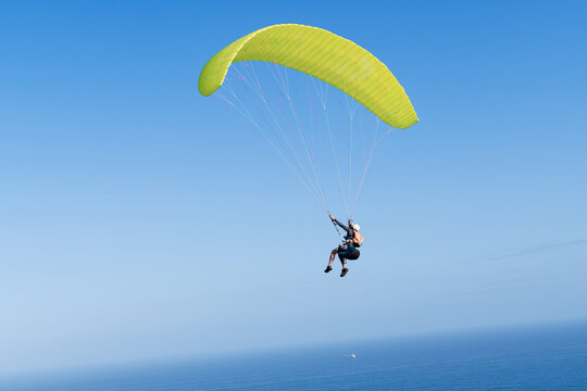 Paraglider Against Brilliant Blue Sky