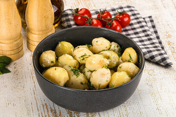 Young boiled mini potato with dill