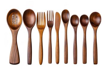 A collection of handcrafted wooden spoons and forks with intricate carvings and unique grain patterns isolated on transparent background