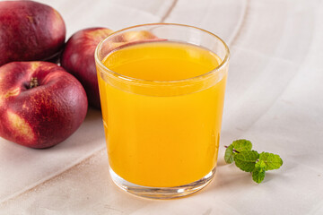 Vitamin beverage - peach juice glass