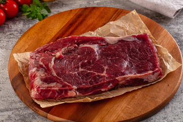 Gourmet raw rib eye steak