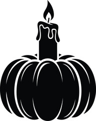 Silhouette of a lit candle on a pumpkin