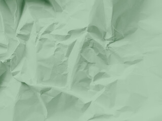 Obraz premium Green background crumpled paper scrapbook empty abstract backdrop, texture wrinkled card grunge sheet cardboard rough letter newspaper mockup cosmetic or eco system environment change natural.