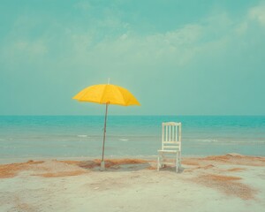 Obraz premium Empty Beach Scene With Yellow Umbrella And White Chair