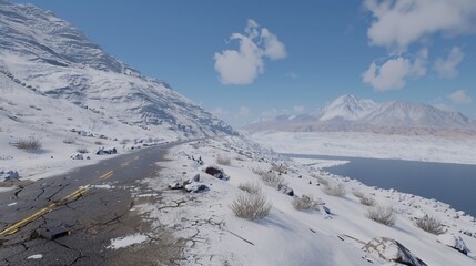 A snow-covered mountain road curves along a lake under a cloudy blue sky