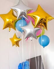 Golden Christmas stars with ribbon