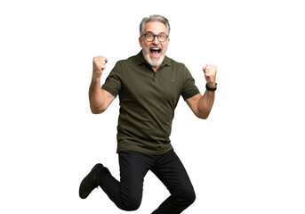 Excited older man jumping with fists raised isolated on transparent background