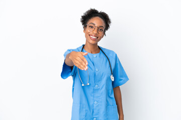 Young surgeon African American doctor woman isolated on white background shaking hands for closing a good deal