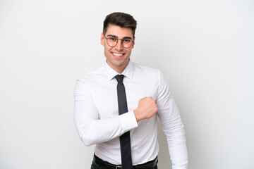 Business caucasian man isolated on white background celebrating a victory