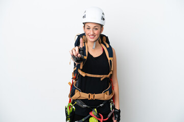 Young caucasian rock climber woman isolated on white background showing and lifting a finger