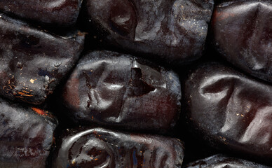 Dried dates as a background. Close-up