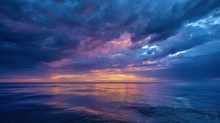 Serene Blue Ocean and Dramatic Sky at Sunset.