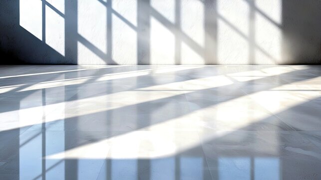 Geometric shadows from a window fall across a clean, bright room with a polished marble floor and a textured wall.