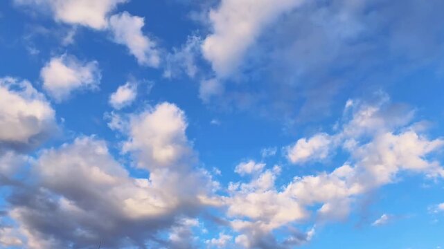 4K Timelapse of Autumn Altocumulus Clouds Forming and Fading in a Clear Blue Sky