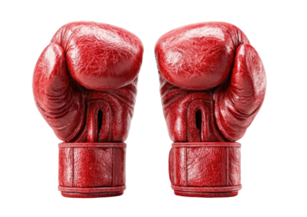 Two worn, red leather boxing gloves face forward