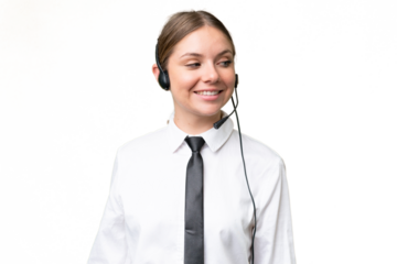 Telemarketer caucasian woman working with a headset over isolated background with happy expression