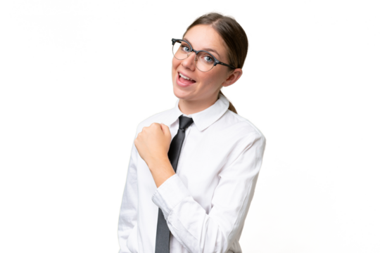 Young business caucasian woman over isolated background celebrating a victory