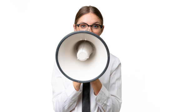 Young business caucasian woman over isolated background shouting through a megaphone