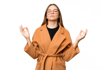 Young blonde woman over isolated chroma key background in zen pose