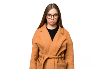 Young blonde woman over isolated chroma key background with sad expression