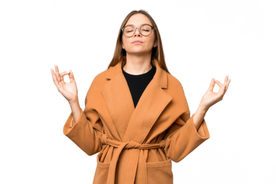Young blonde woman over isolated chroma key background in zen pose - Powered by Adobe