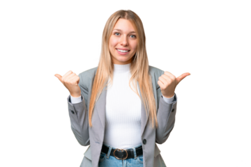 Young pretty blonde woman over isolated chroma key background with thumbs up gesture and smiling
