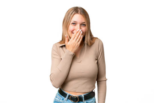 Young pretty blonde woman over isolated chroma key background happy and smiling covering mouth with hand