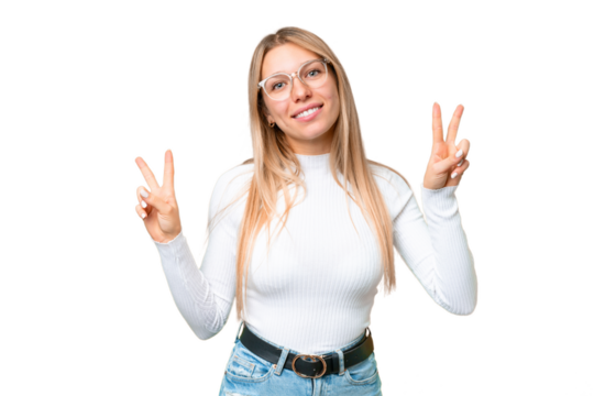 Young pretty blonde woman over isolated chroma key background showing victory sign with both hands