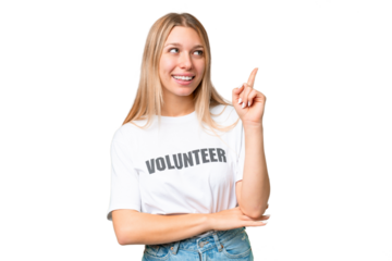 Young volunteer woman over isolated chroma key background pointing up a great idea