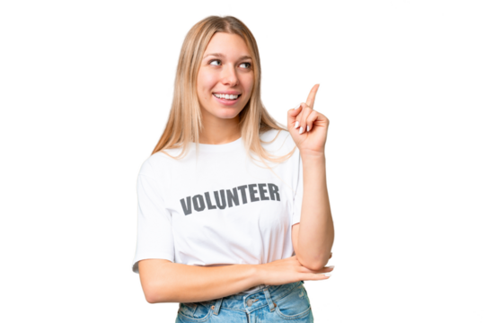 Young volunteer woman over isolated chroma key background pointing up a great idea
