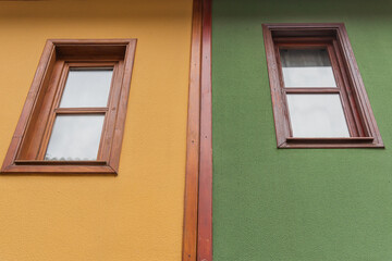 Symmetrical Arched Windows in a Stone Masonry Wall