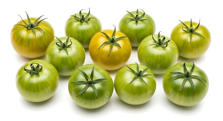 A group of ripe green tomatoes and one yellow tomato arranged on a white background fruit vegetable