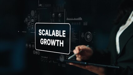 Business Professional Demonstrating Scalable Growth Concept Through Digital Interface with Graphs and Data Visualizations. Asymptotic smart data analytic.