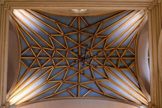 Ornate Vaulted Ceiling with Golden Ribs and Chandelier Lima Peru - Powered by Adobe