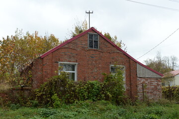 An old brick house in the village of Druzhba in the Pravdinsky district of the Kaliningrad region