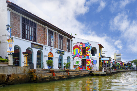Malacca, Malaysia &ndash; April 15, 2025 : Colorful old houses converted into restaurants or shops along the Malacca or Melaka river riverfront, Malacca, Malaysia