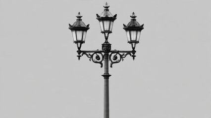 An ornate, triple-headed street lamp with intricate metalwork and classic lanterns stands tall against a plain grey background, a timeless urban fixture.